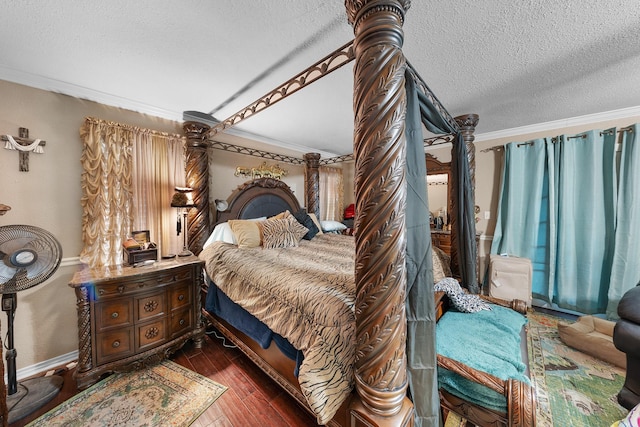 1605 County Road 1195, Yantis, TX 75497 - bedroom with a textured ceiling, ornamental molding, and dark wood-type flooring