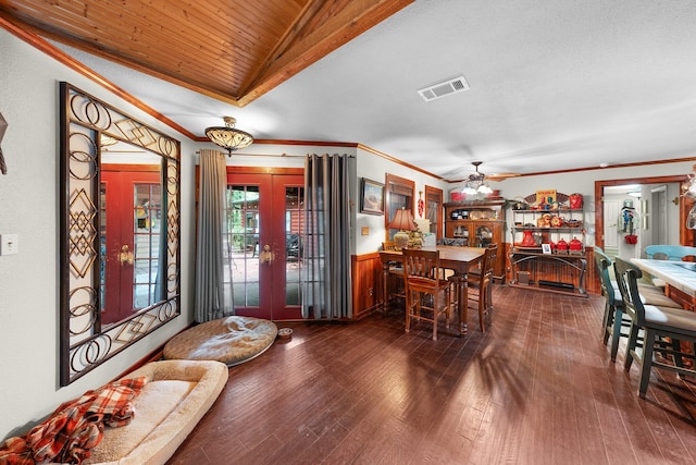 1605 County Road 1195, Yantis, TX 75497 - dining space featuring french doors, ceiling fan, dark wood-type flooring, ornamental molding, and wooden ceiling