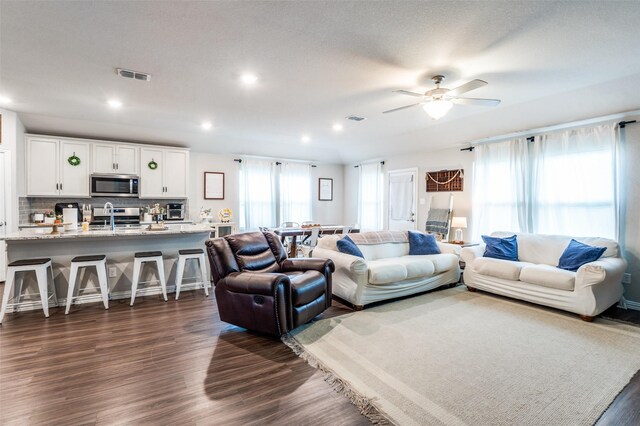2805 Field St, Celina, TX 75009 - living area with dark wood-style flooring, a ceiling fan, and recessed lighting