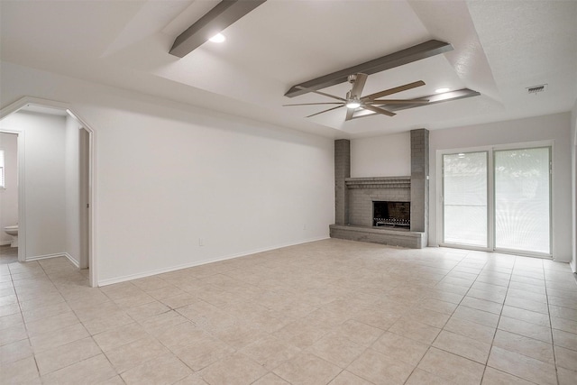 3925 Singleleaf Ln, Fort Worth, TX 76133 - unfurnished living room with a ceiling fan, beamed ceiling, a fireplace, light tile patterned flooring, and recessed lighting
