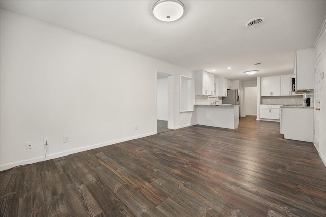2250 Capri Dr, Fort Worth, TX 76114 - unfurnished living room with dark wood-style floors and ornamental molding
