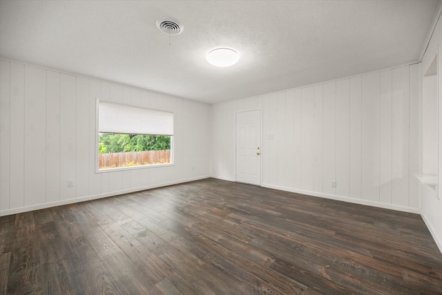 2250 Capri Dr, Fort Worth, TX 76114 - unfurnished room featuring dark wood-type flooring and baseboards