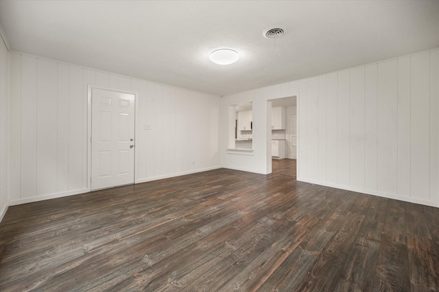 2250 Capri Dr, Fort Worth, TX 76114 - empty room featuring dark wood-style flooring and baseboards