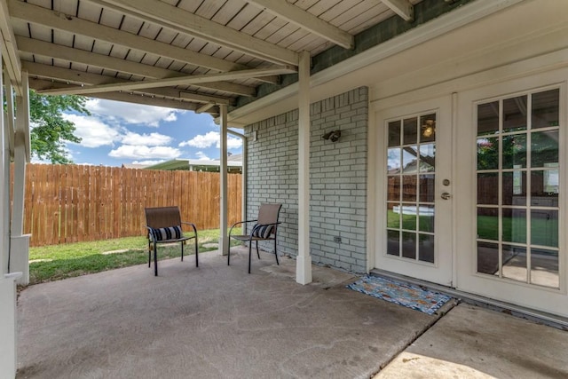 4113 Blue Flag Ln, Fort Worth, TX 76137 - view of patio featuring french doors
