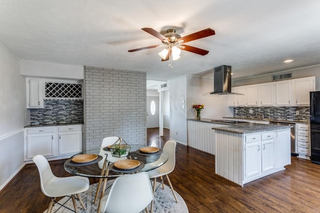 4113 Blue Flag Ln, Fort Worth, TX 76137 - kitchen featuring island exhaust hood, a ceiling fan, backsplash, and white cabinetry