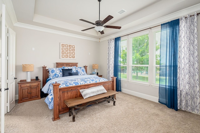 1251 Castle Dr, Prosper, TX 75078 - bedroom featuring light carpet, a raised ceiling, and a ceiling fan