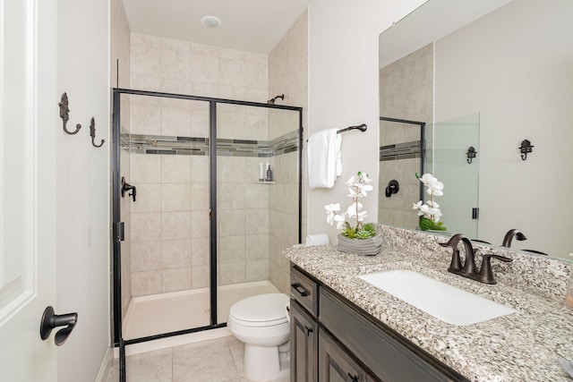 1251 Castle Dr, Prosper, TX 75078 - bathroom with vanity, a shower stall, and tile patterned flooring