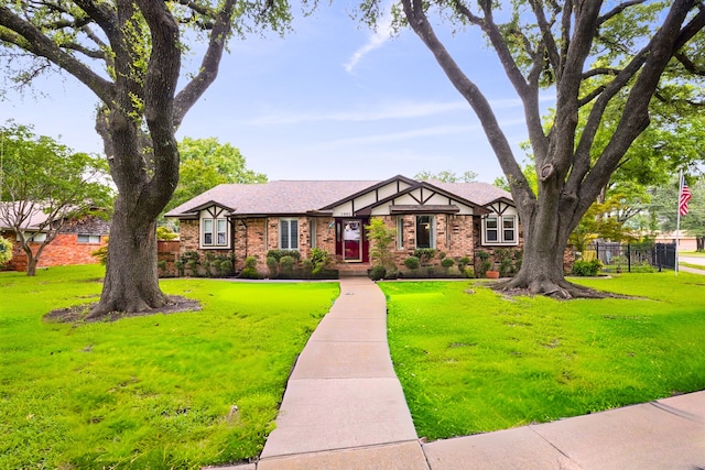 1301 Warwick St, Garland, TX 75040 - english style home featuring brick siding and roof with shingles