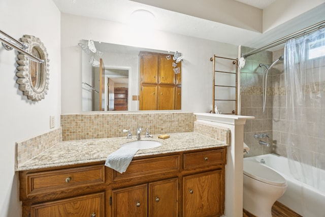 1301 Warwick St, Garland, TX 75040 - bathroom featuring backsplash, vanity, and shower / bath combination
