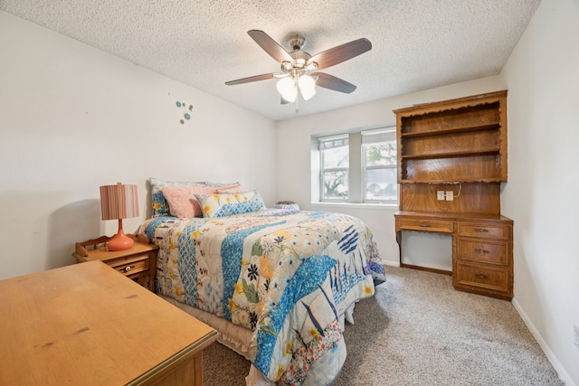 1301 Warwick St, Garland, TX 75040 - bedroom with light colored carpet, a textured ceiling, and a ceiling fan