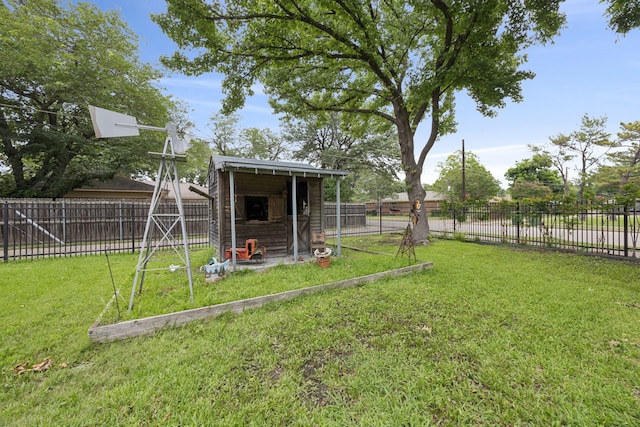 1301 Warwick St, Garland, TX 75040 - fenced backyard featuring an outbuilding