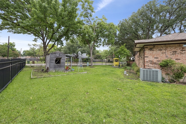 1301 Warwick St, Garland, TX 75040 - fenced backyard featuring a storage unit