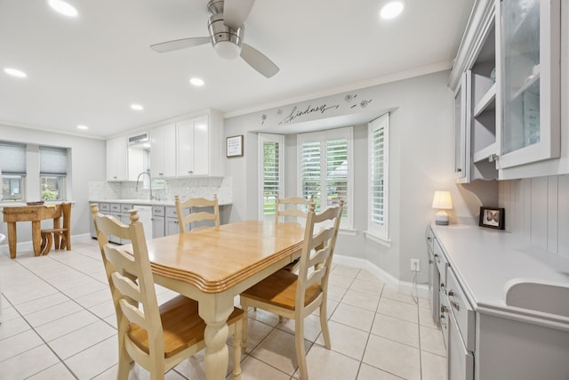 1301 Warwick St, Garland, TX 75040 - dining area featuring ornamental molding, plenty of natural light, light tile patterned floors, a ceiling fan, and recessed lighting