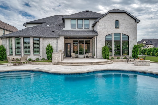3791 Marble Hill Rd, Frisco, TX 75034 - outdoor pool with an outdoor fire pit and a patio