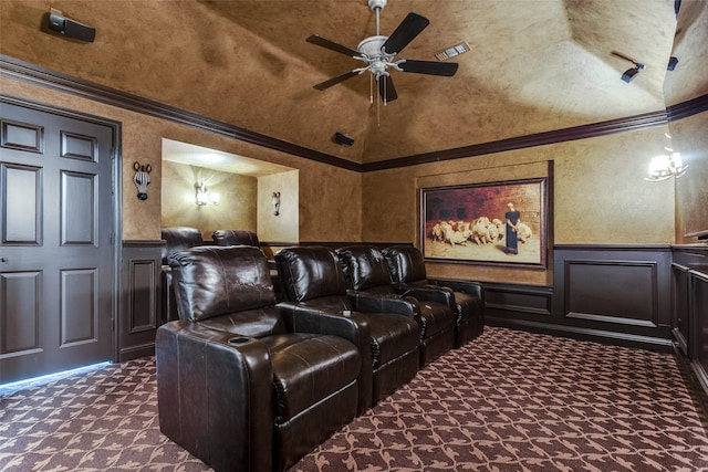 1641 Crockett Dr, Frisco, TX 75033 - cinema room with a decorative wall, a ceiling fan, ornamental molding, dark colored carpet, and wainscoting