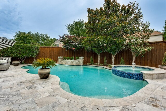 1641 Crockett Dr, Frisco, TX 75033 - view of swimming pool featuring a fenced backyard, a patio area, and a pool with connected hot tub