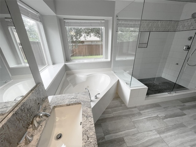 1622 Hightimber Ln, Wylie, TX 75098 - bathroom featuring a stall shower and a bath
