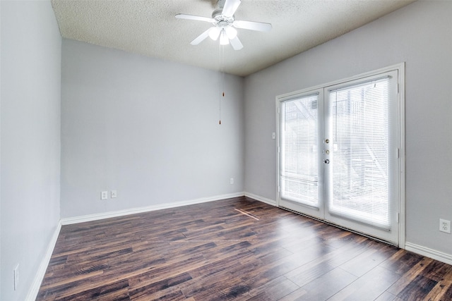 9747 Whitehurst Dr Unit 150, Dallas, TX 75243 - unfurnished room featuring dark wood-style floors, a ceiling fan, a textured ceiling, and french doors