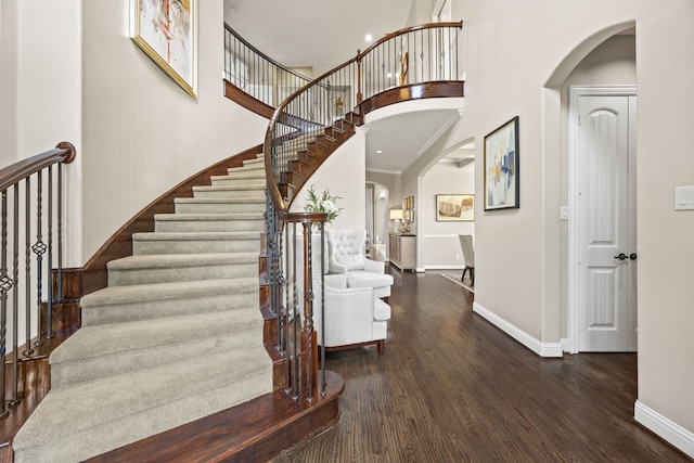 881 Derick Ln, Prosper, TX 75078 - entryway featuring arched walkways, wood finished floors, stairway, a high ceiling, and recessed lighting