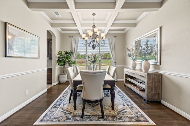 881 Derick Ln, Prosper, TX 75078 - dining space featuring a chandelier, arched walkways, dark wood finished floors, beamed ceiling, and coffered ceiling
