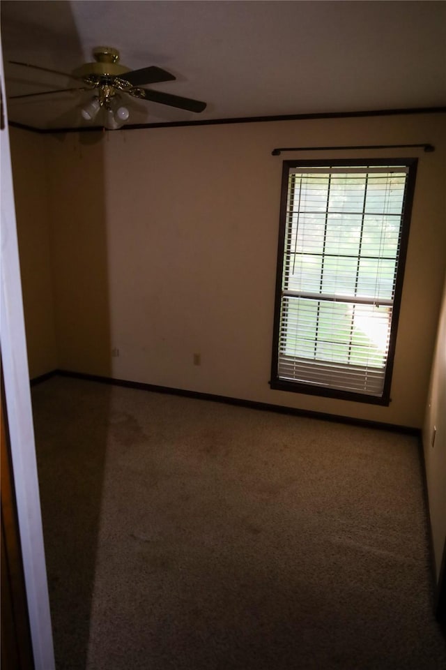 130 Golfcrest St, Rusk, TX 75785 - empty room featuring carpet floors and a ceiling fan