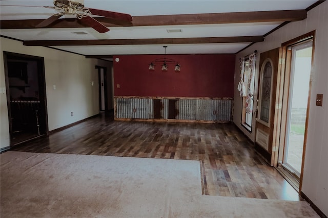 130 Golfcrest St, Rusk, TX 75785 - spare room with wood finished floors, beamed ceiling, and ceiling fan