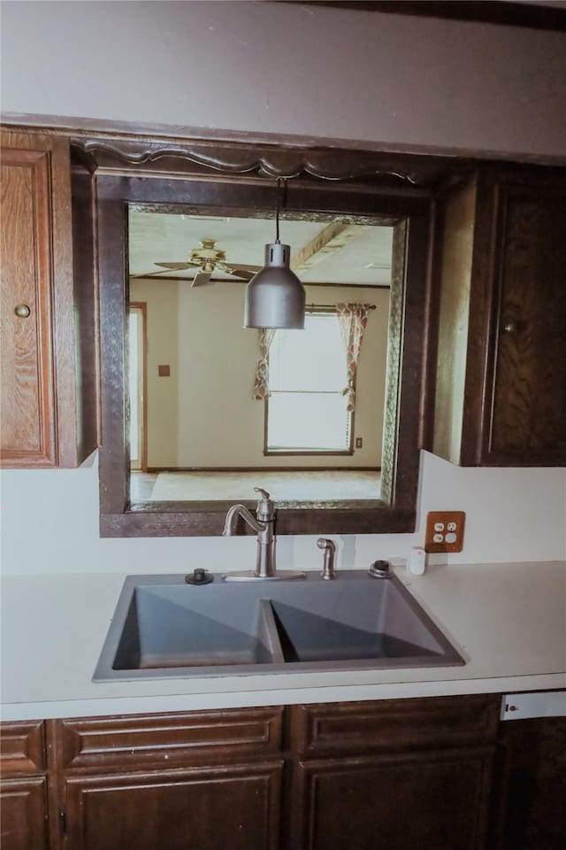 130 Golfcrest St, Rusk, TX 75785 - kitchen featuring light countertops, dark brown cabinets, and dishwasher