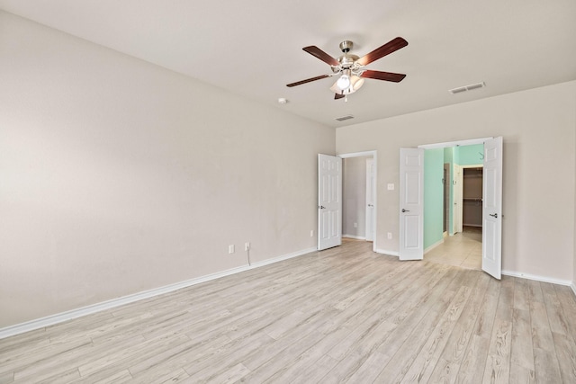5365 Saba Dr, Fort Worth, TX 76119 - unfurnished bedroom with light wood-style flooring and ceiling fan