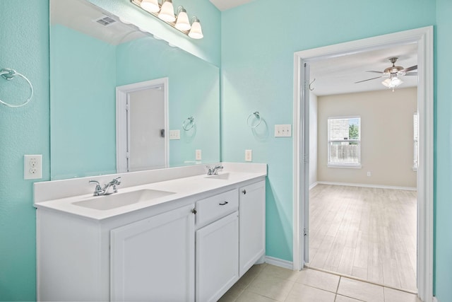 5365 Saba Dr, Fort Worth, TX 76119 - bathroom featuring double vanity and ceiling fan