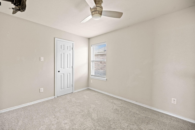 5365 Saba Dr, Fort Worth, TX 76119 - carpeted empty room with a ceiling fan and baseboards