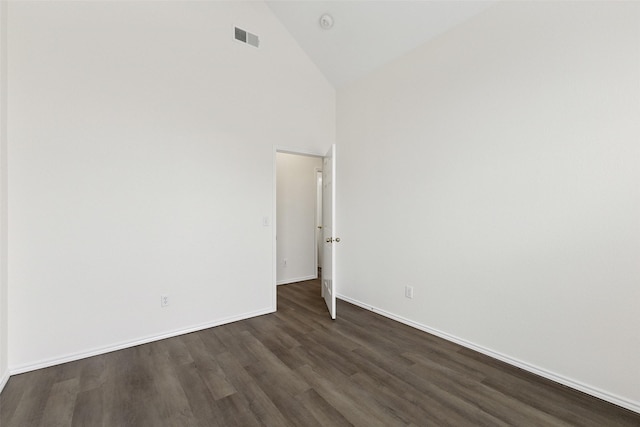 9942 Laurel Ln, Frisco, TX 75035 - spare room with high vaulted ceiling and dark wood finished floors