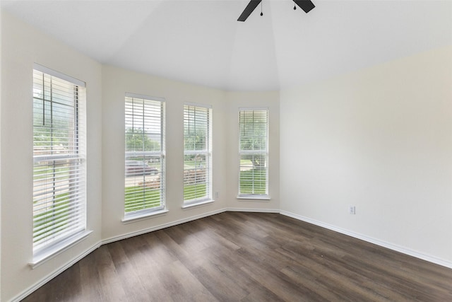 9942 Laurel Ln, Frisco, TX 75035 - spare room featuring plenty of natural light, dark wood-type flooring, ceiling fan, and vaulted ceiling