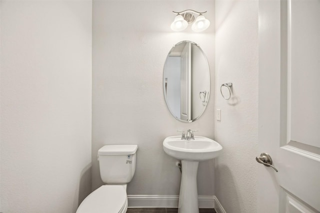 3516 Hathaway Ct, Irving, TX 75062 - half bath with toilet and baseboards