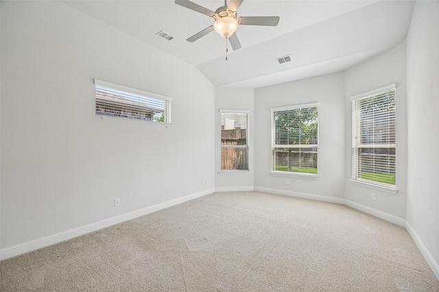 3516 Hathaway Ct, Irving, TX 75062 - empty room with healthy amount of natural light, light carpet, lofted ceiling, and ceiling fan