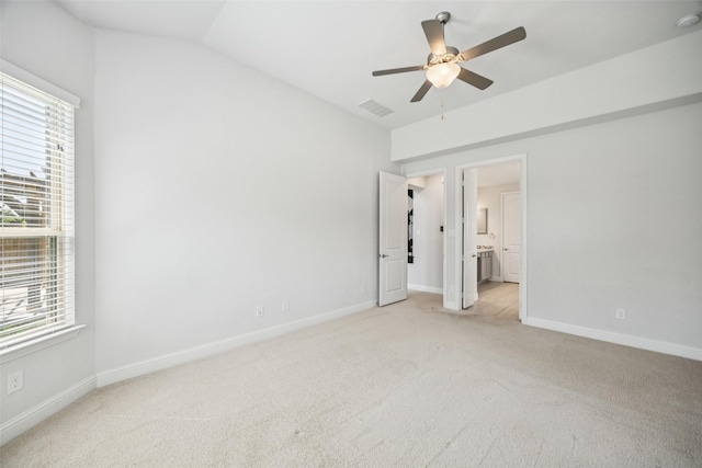 3516 Hathaway Ct, Irving, TX 75062 - unfurnished bedroom with carpet floors, multiple windows, ensuite bath, and a ceiling fan