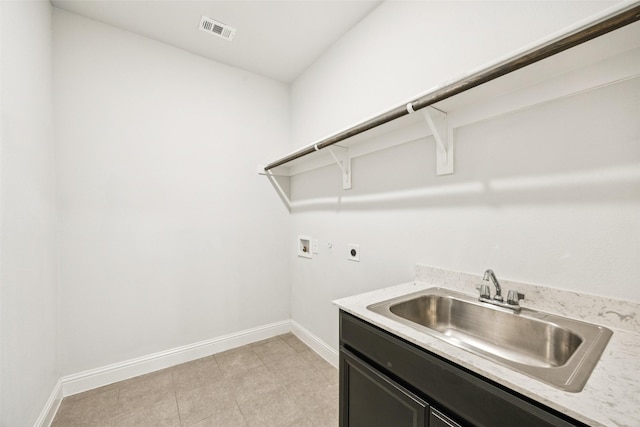 3516 Hathaway Ct, Irving, TX 75062 - laundry room with electric dryer hookup, cabinet space, and washer hookup