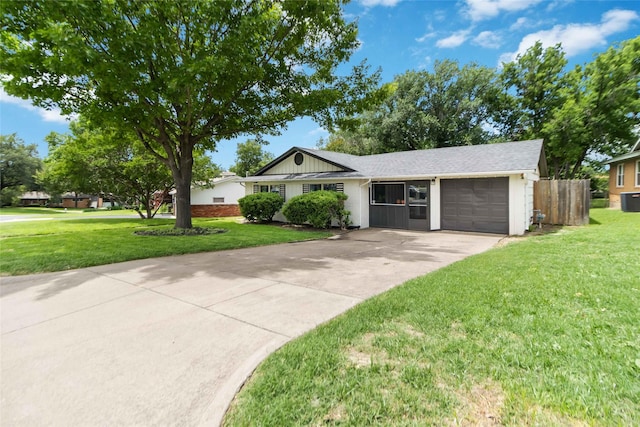 4912 Odessa Ave, Fort Worth, TX 76133 - ranch-style home featuring a garage, concrete driveway, and board and batten siding