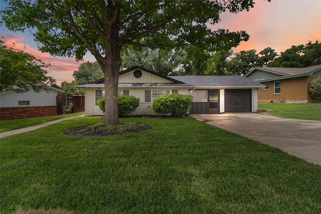 4912 Odessa Ave, Fort Worth, TX 76133 - ranch-style house with driveway, an attached garage, and a front lawn