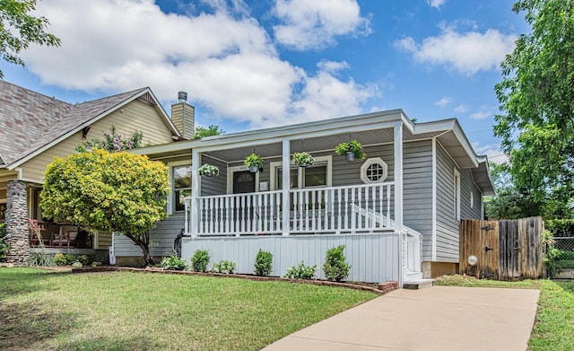 4012 Dexter Ave, Fort Worth, TX 76107 - view of front of house with covered porch and a chimney