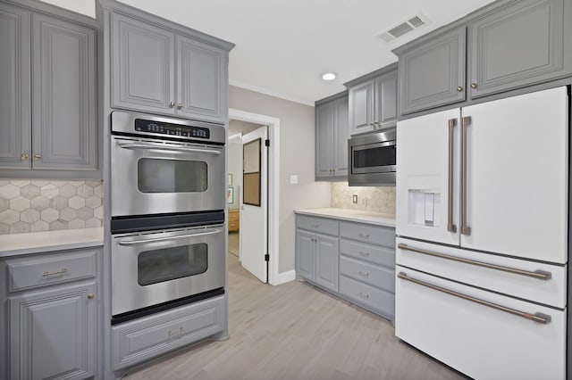 6375 Lansdale Rd, Fort Worth, TX 76116 - kitchen with appliances with stainless steel finishes, gray cabinets, backsplash, light countertops, and recessed lighting