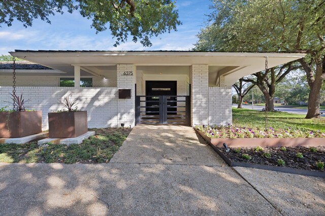 6375 Lansdale Rd, Fort Worth, TX 76116 - doorway to property featuring brick siding