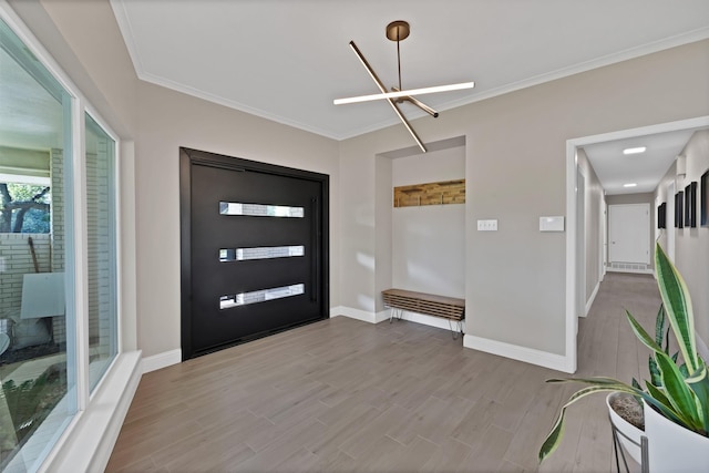 6375 Lansdale Rd, Fort Worth, TX 76116 - foyer entrance featuring wood finished floors, crown molding, and a chandelier