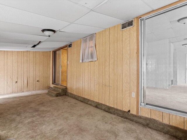415 S Union St, Montague, TX 76251 - finished basement featuring carpet flooring, a drop ceiling, and wooden walls