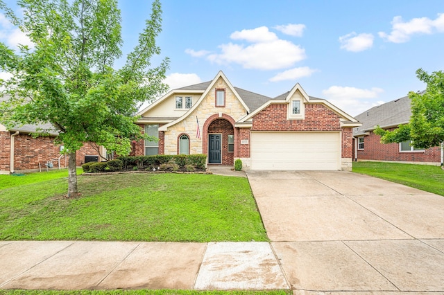 8225 Courtney Way, Watauga, TX 76148 - view of front of home featuring an attached garage, a front yard, and driveway
