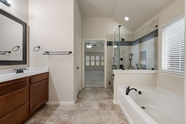8225 Courtney Way, Watauga, TX 76148 - bathroom with a bath, vanity, a stall shower, and a ceiling fan