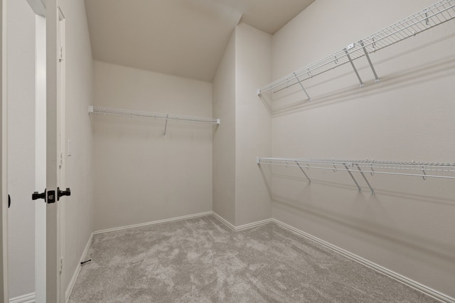 8225 Courtney Way, Watauga, TX 76148 - spacious closet featuring carpet floors