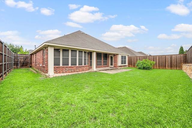 8225 Courtney Way, Watauga, TX 76148 - back of property with brick siding, a fenced backyard, a patio, and roof with shingles
