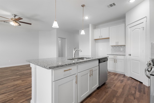 6112 Fall Creek Ln, Fort Worth, TX 76123 - kitchen with stainless steel appliances, ceiling fan, dark wood-style flooring, backsplash, and recessed lighting