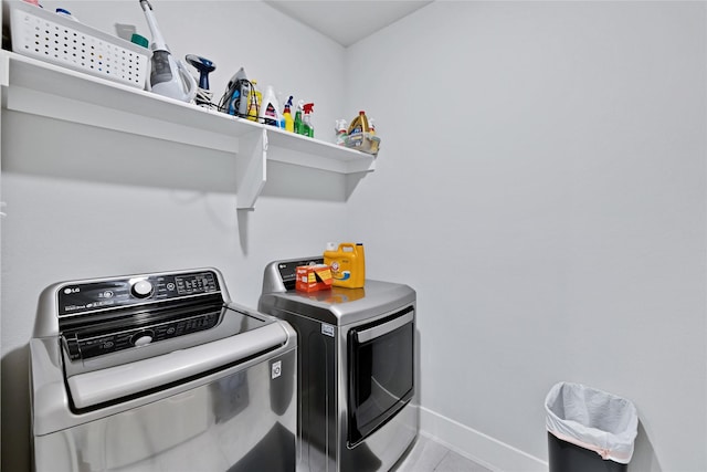 1429 Arrowwood Dr, Aubrey, TX 76227 - laundry room with separate washer and dryer and baseboards