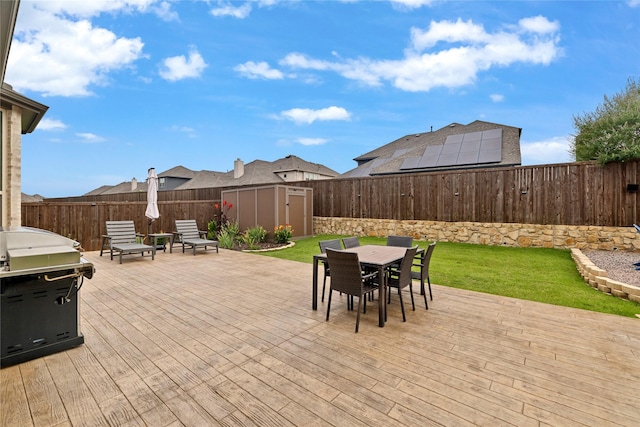 1429 Arrowwood Dr, Aubrey, TX 76227 - wooden terrace featuring a shed, outdoor dining space, and a fenced backyard